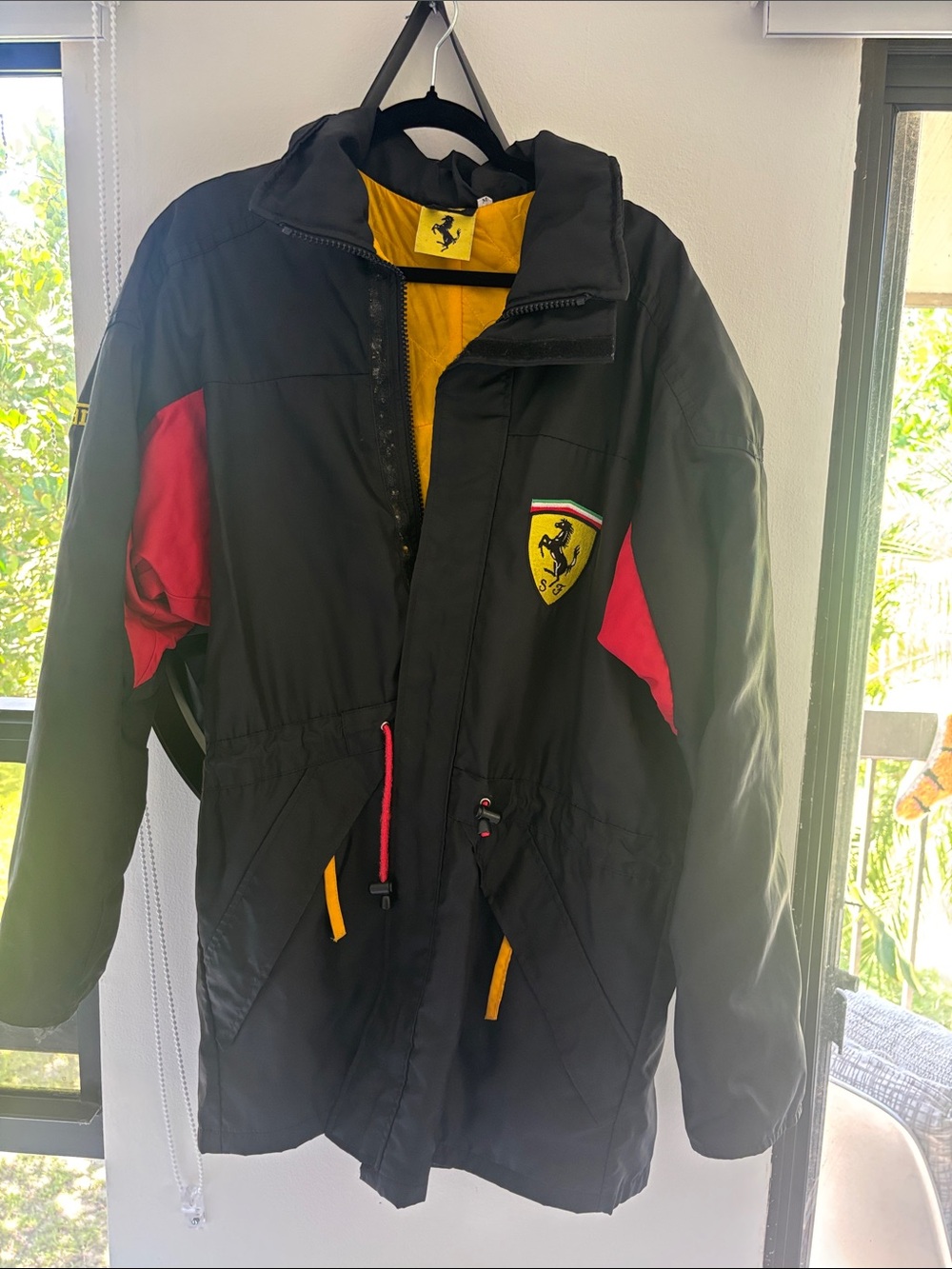 Ferrari Black Jacket with Red Accents and Yellow Lining